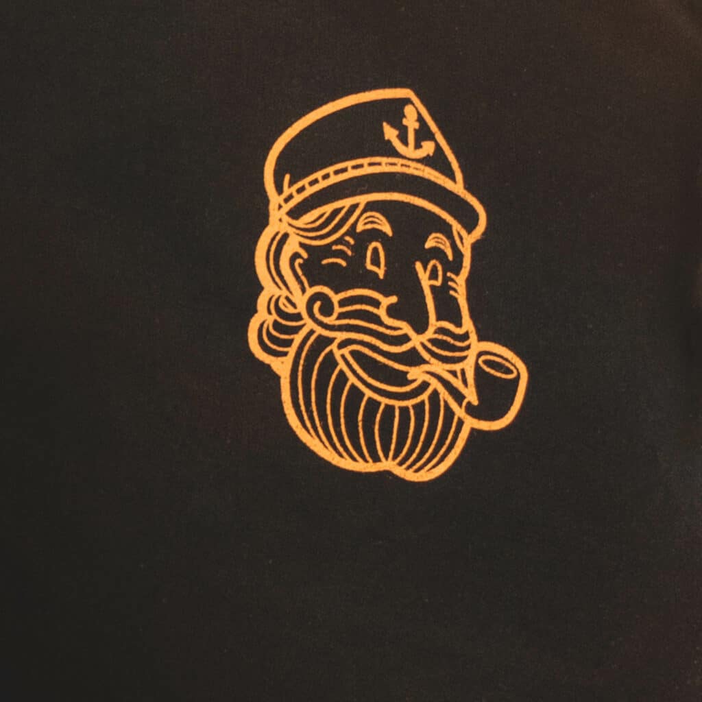 reefers tees close-up of the reefers social club's logo
